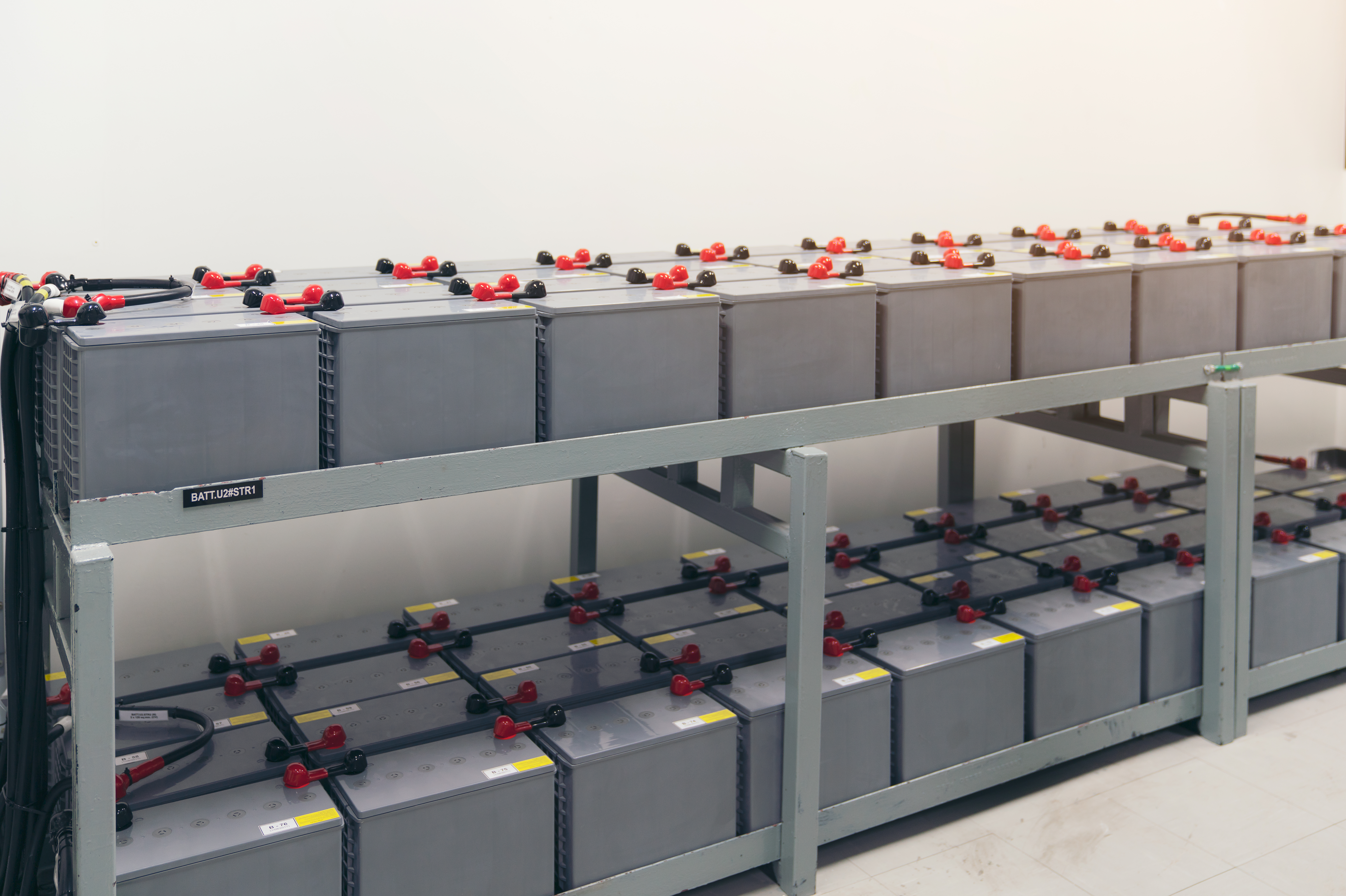 used golf cart batteries on a shelf