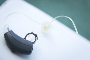 hearing aid with battery showing